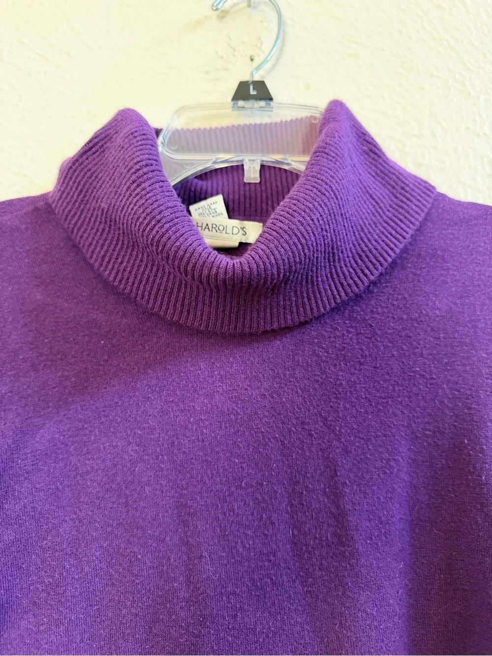 Harold’s purple turtleneck sweater